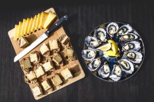 Bruny Island Food, Sightseeing, Guided Lighthouse Tour & Lunch - Adventure Bay and Hummock Lookout: warm breads, oysters, and meaning