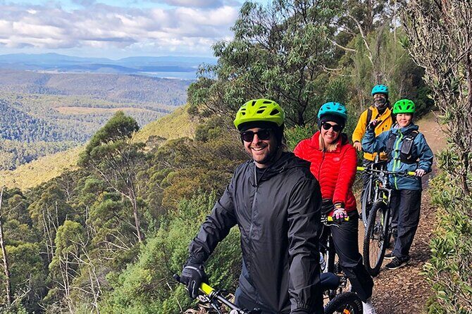Easy Bike Tour - Mt Wellington Summit Descent & Rainforest Ride - What to pack for Mt Wellington wind chill and wet-finish weather