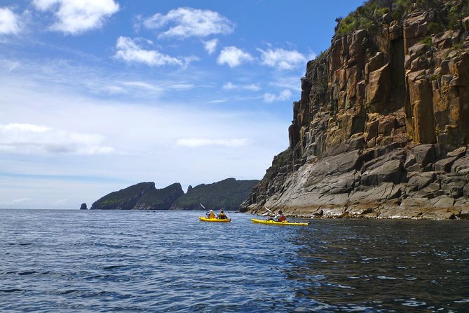Tasman Peninsula full day kayaking tour - Gear that actually matters: spray jackets, booties, and double-kayak control
